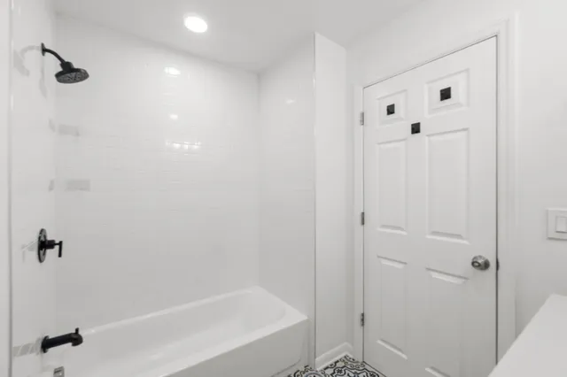 a view of roof deck with patio