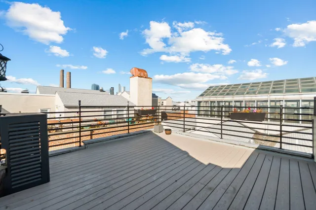 a view of a terrace with outdoor seating