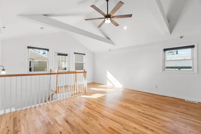 a view of a livingroom with wooden floor
