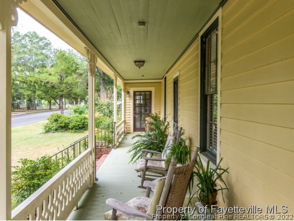 524 Carthage Street Cameron, NC 28326 - Photo 12 of 16 a view of balcony with furniture
