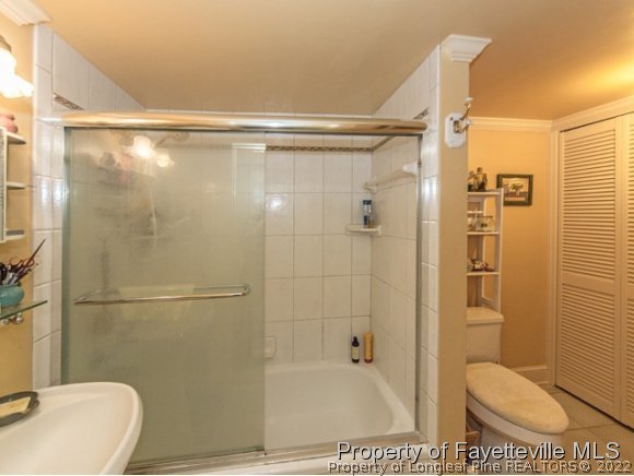 524 Carthage Street Cameron, NC 28326 - Photo 9 of 16 a bathroom with a shower and a toilet