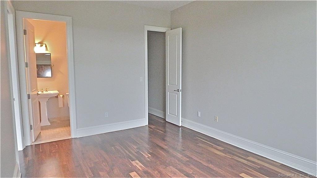 75 Stone Ridge Way, Unit 3E Fairfield, CT 06824 - Photo 10 of 23 Second bedroom with it's own private bathroom and closet for guests or can be used a den or dining room