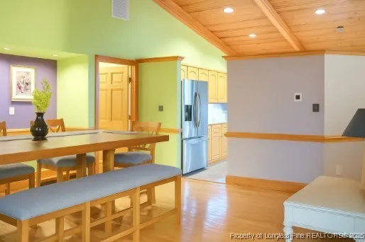 a large bathroom with a large tub and sink