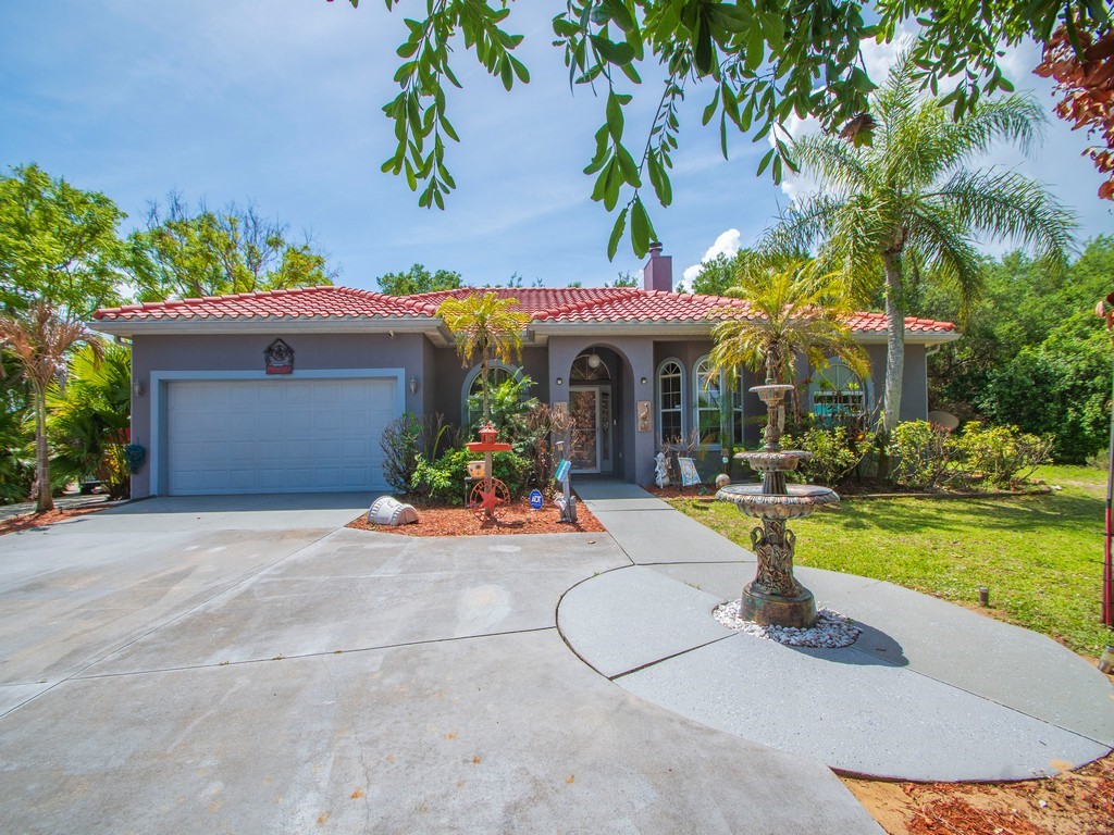 10615 Highway 1 Sebastian, FL 32958 - Photo 1 of 33 a view of a house with a yard and sitting area