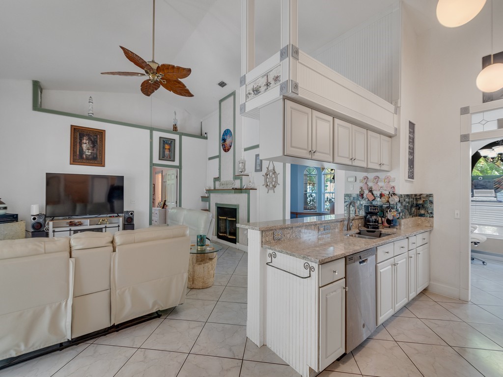 10615 Highway 1 Sebastian, FL 32958 - Photo 12 of 33 a kitchen with cabinets a sink and a stove