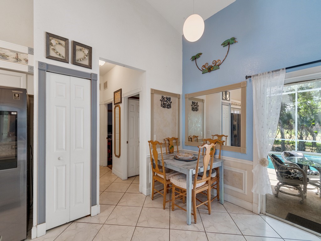 10615 Highway 1 Sebastian, FL 32958 - Photo 13 of 33 a dining room with furniture and a window