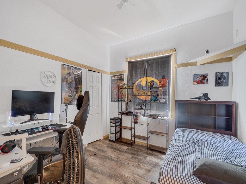 10615 Highway 1 Sebastian, FL 32958 - Photo 20 of 33 a bedroom with furniture and a flat screen tv