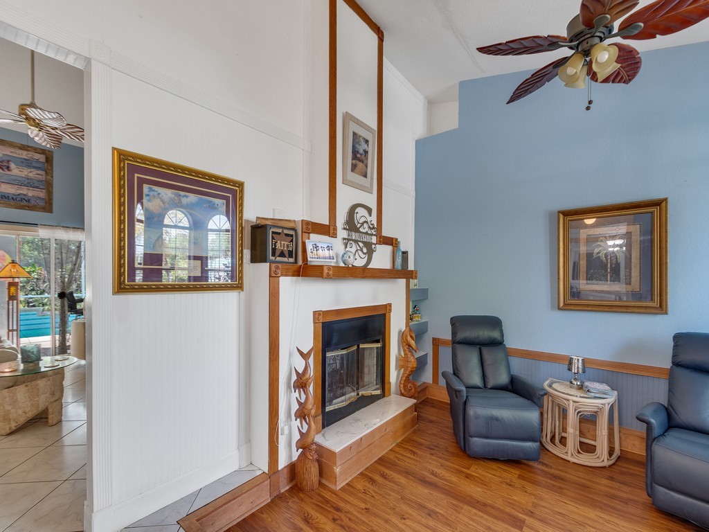10615 Highway 1 Sebastian, FL 32958 - Photo 7 of 33 a living room with furniture and a fireplace
