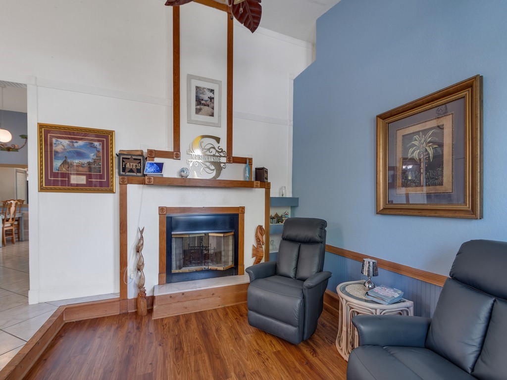 10615 Highway 1 Sebastian, FL 32958 - Photo 8 of 33 a living room with furniture and a fireplace