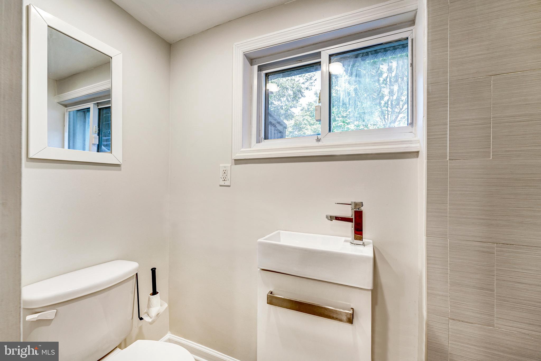 2339 3rd Street Northeast Washington, DC 20002 - Photo 33 of 59 Luxury full bath with ceramic-tile shower!