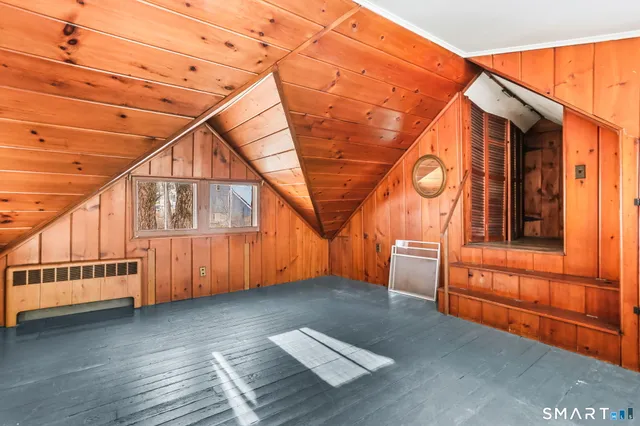 a kitchen with stainless steel appliances granite countertop a sink and a refrigerator