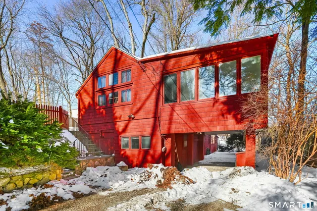 a picture of a bathroom with a shower
