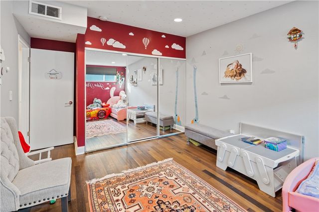 a living room with couch and a table