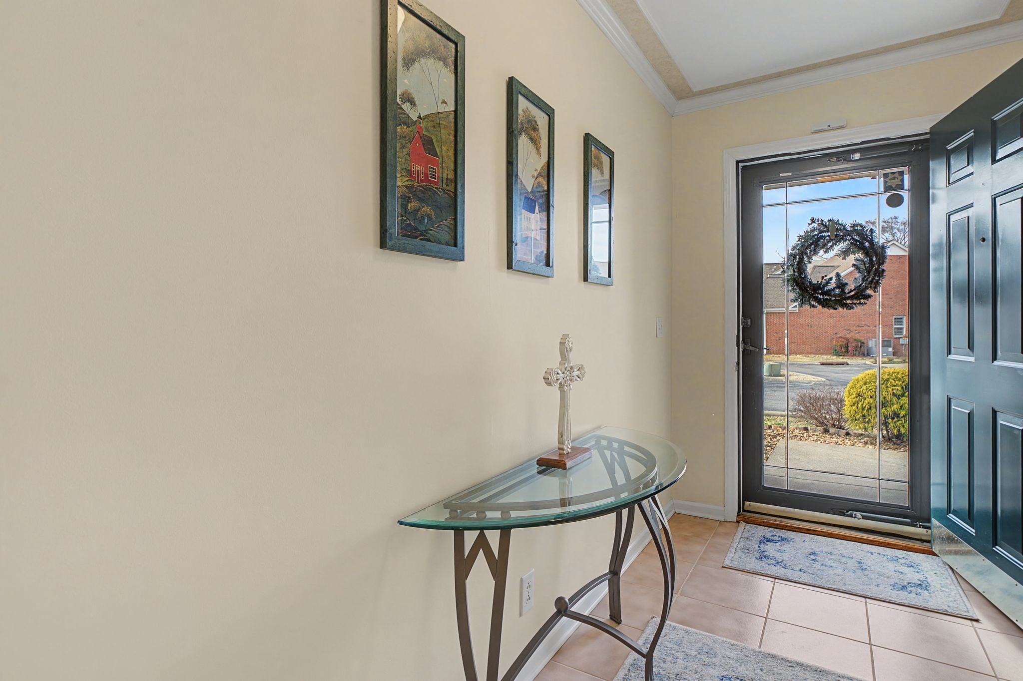 349 Calumet Trace Murfreesboro, TN 37127 - Photo 4 of 30 a view of a hallway with paintings on the wall