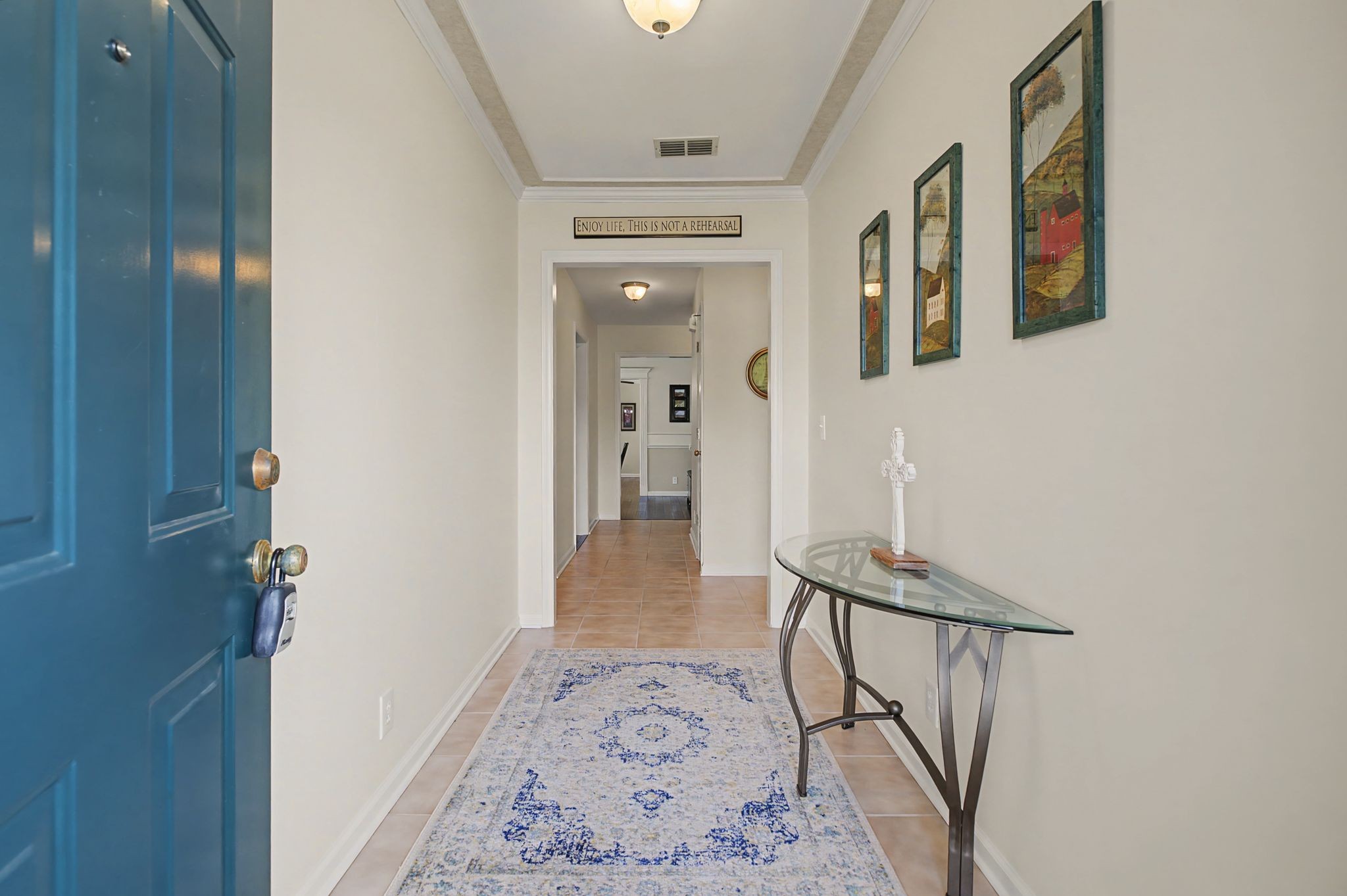 349 Calumet Trace Murfreesboro, TN 37127 - Photo 5 of 30 a view of a hallway with wooden floor and a living room
