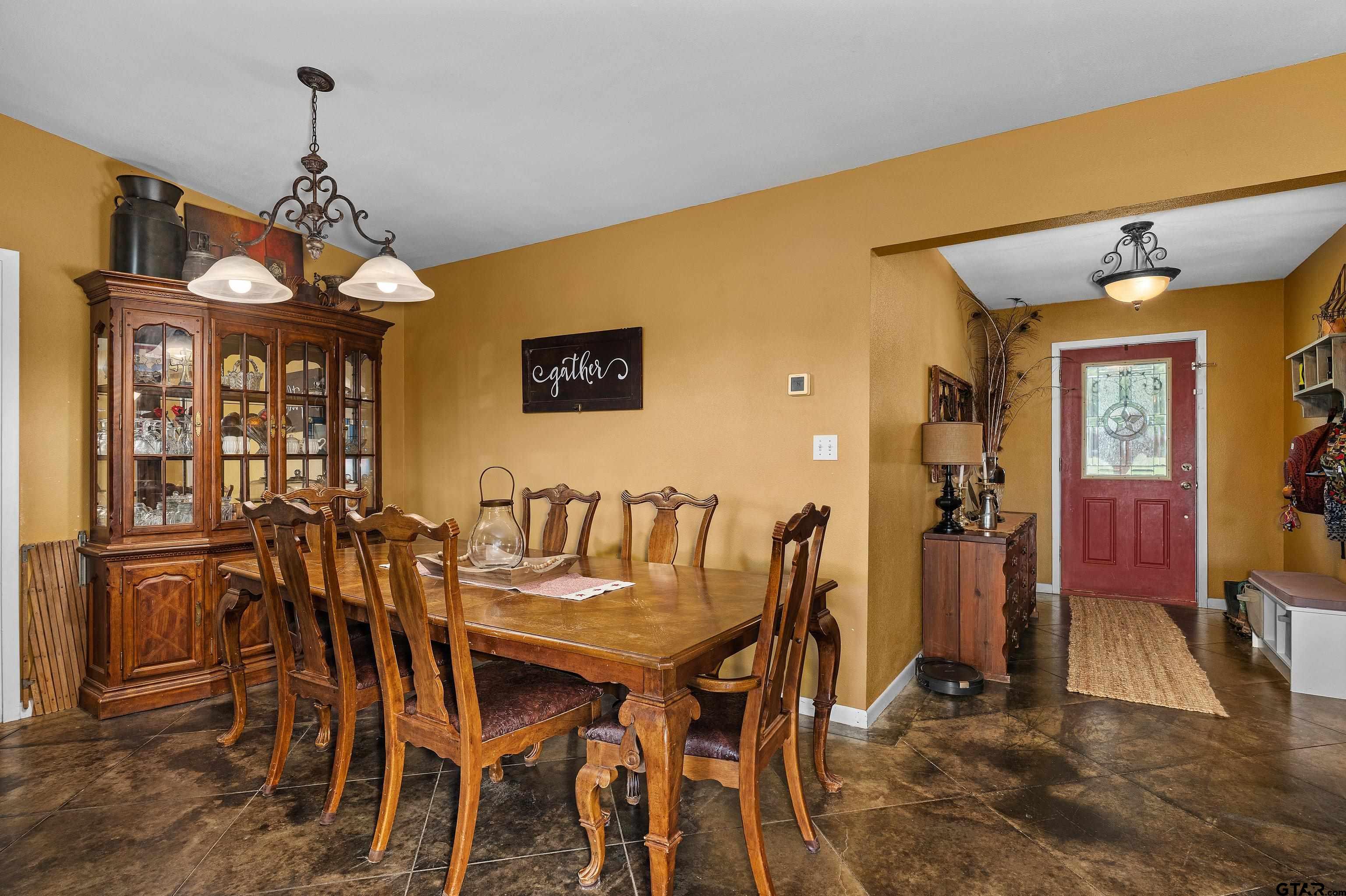 8550 New Hope Road Gilmer, TX 75645 - Photo 6 of 12 a dining room with furniture and window
