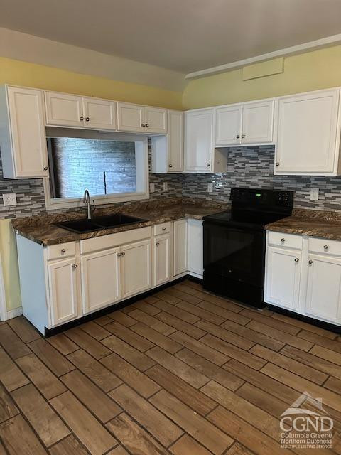 555 West Main Street Catskill, NY 12414 - Photo 13 of 14 a kitchen with granite countertop a sink and cabinets