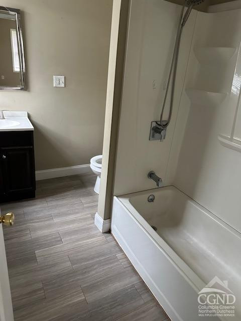 555 West Main Street Catskill, NY 12414 - Photo 9 of 14 a bathroom with a tub a sink and wooden floor