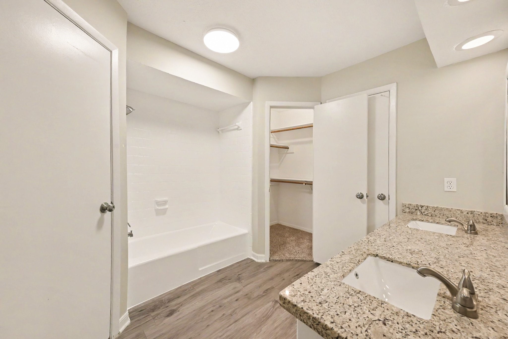 17419 Cassina Drive Spring, TX 77388 - Photo 21 of 35 a bathroom with a granite countertop sink and shower