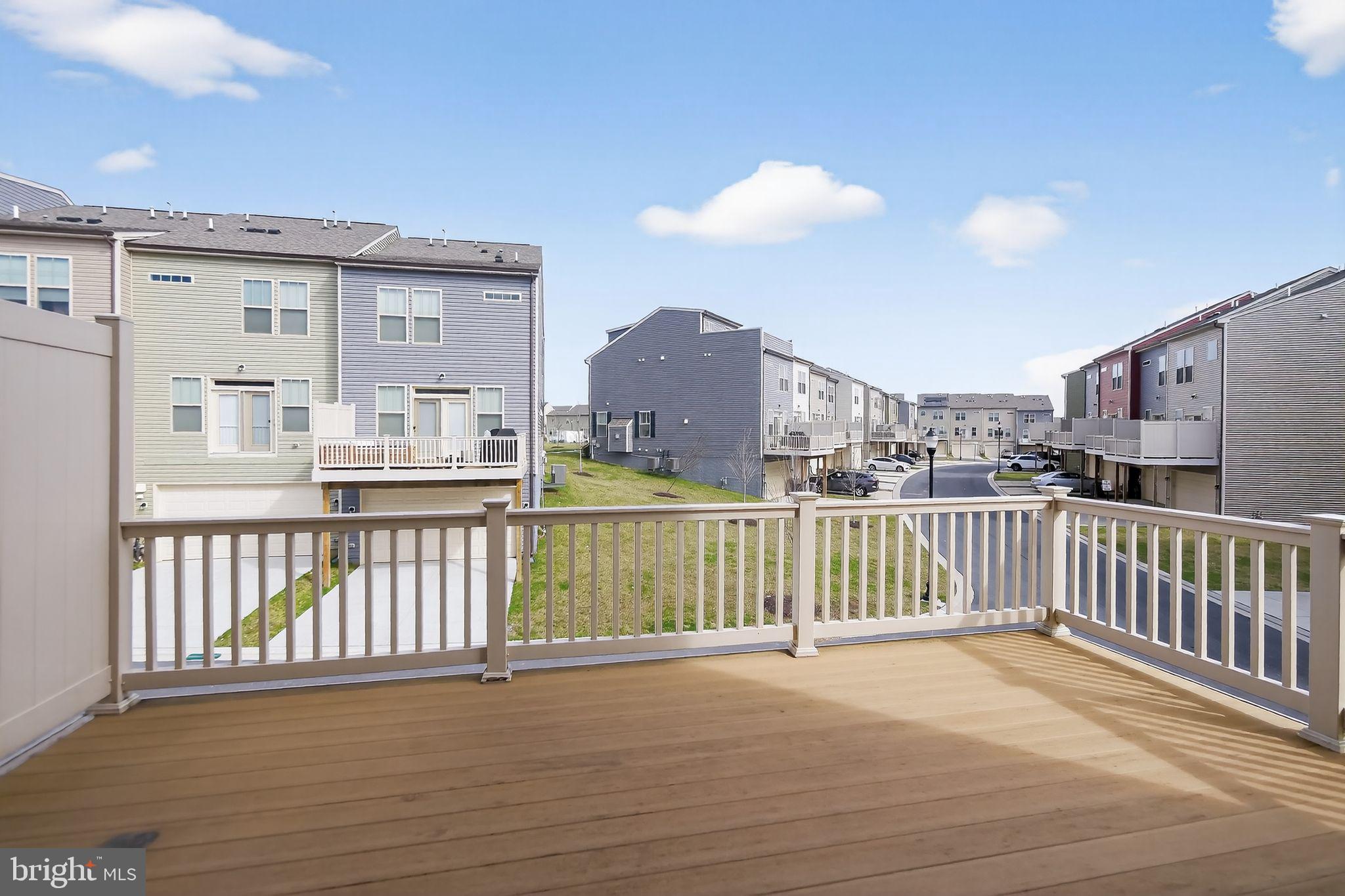 1518 Ricketts Road Frederick, MD 21702 - Photo 3 of 32 a view of a balcony with wooden floor