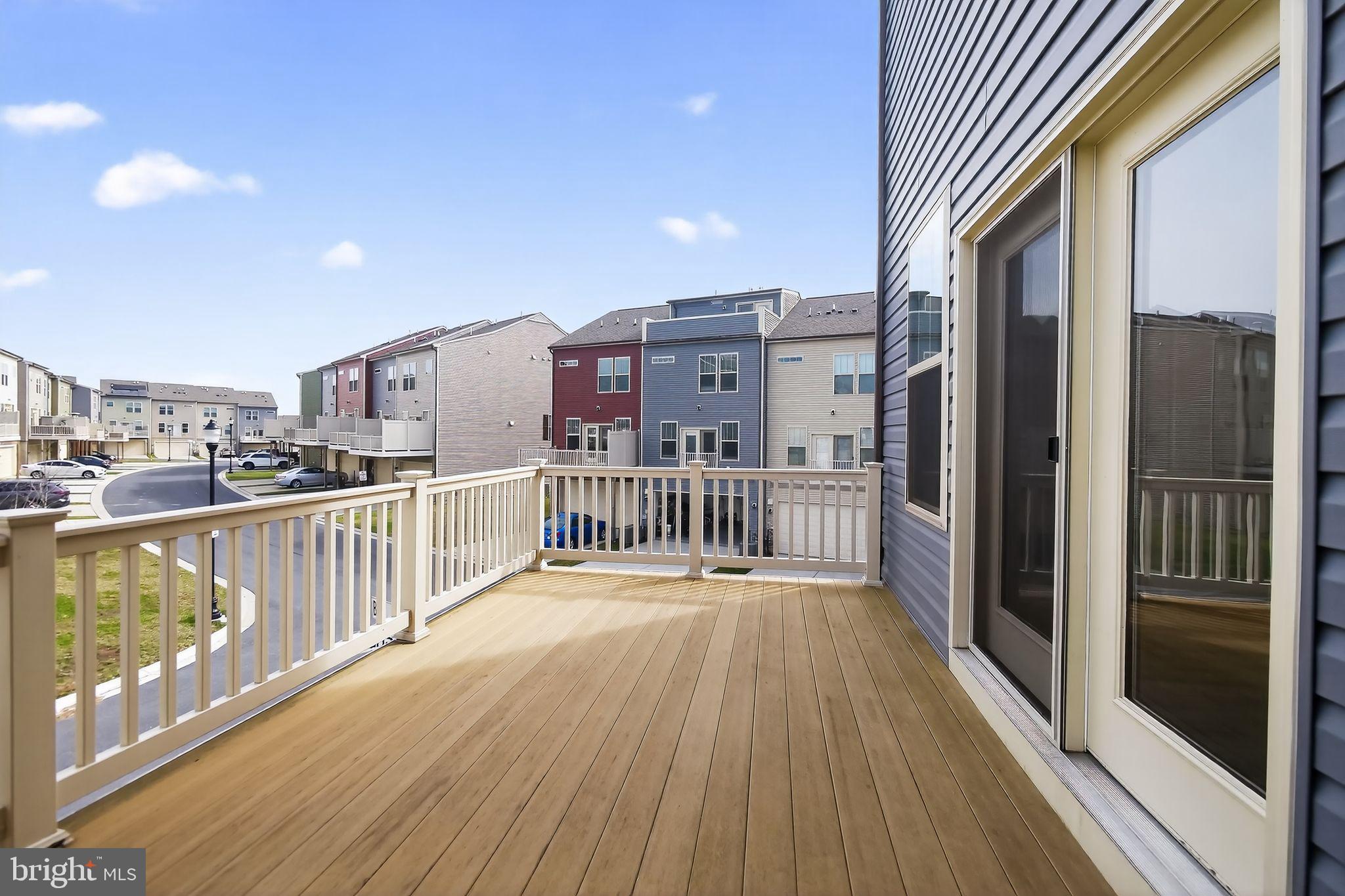 1518 Ricketts Road Frederick, MD 21702 - Photo 4 of 32 a view of a balcony with wooden floor