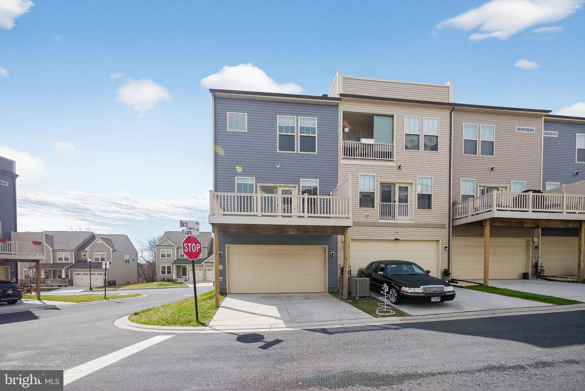 1518 Ricketts Road Frederick, MD 21702 - Photo 5 of 32 a car parked in front of a building