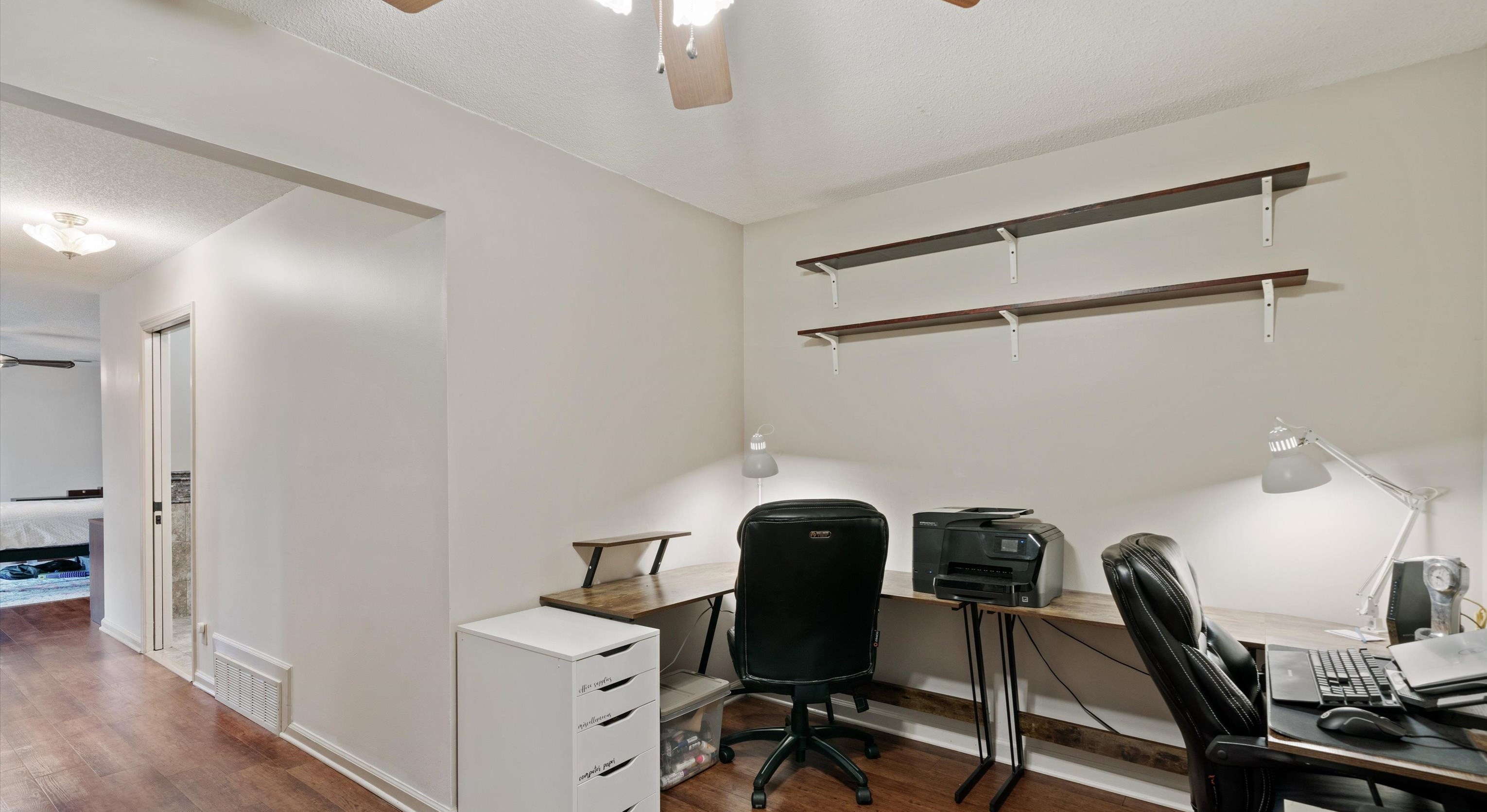 6463 Yale Road Bartlett, TN 38134 - Photo 16 of 29 a view of a workspace with furniture and a window