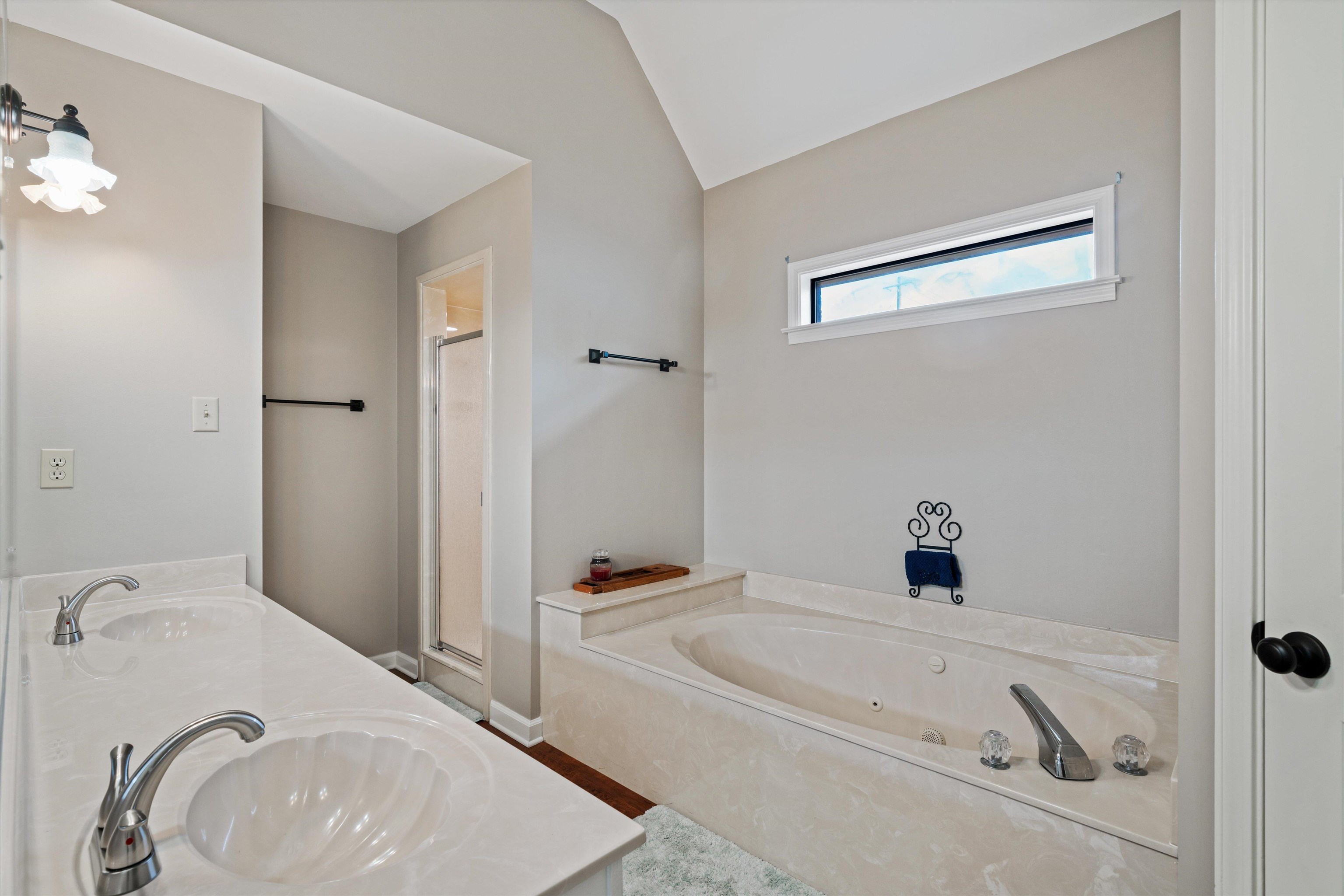 6463 Yale Road Bartlett, TN 38134 - Photo 24 of 29 a bathroom with a sink and a tub