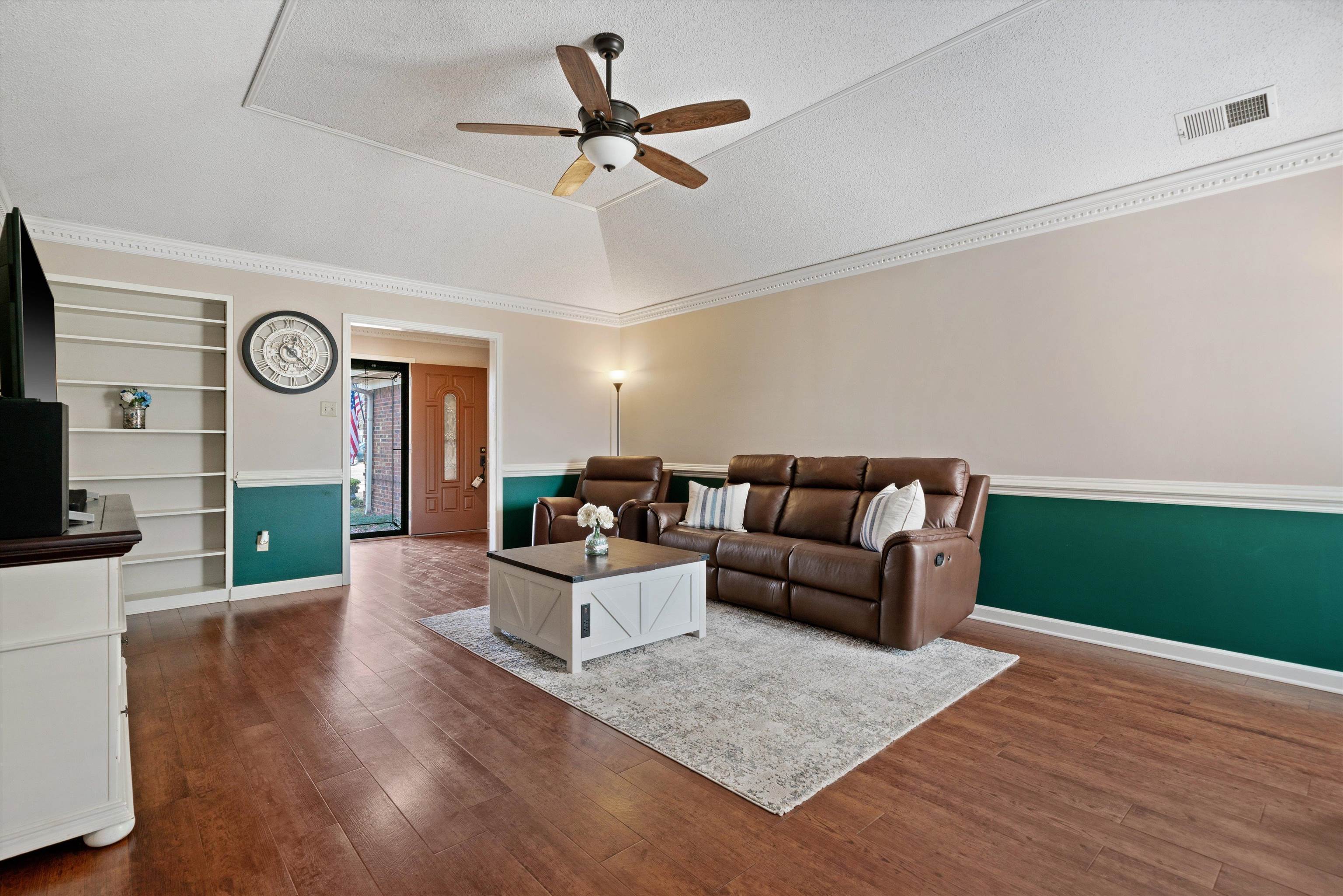 6463 Yale Road Bartlett, TN 38134 - Photo 4 of 29 a living room with furniture wooden floor and a window