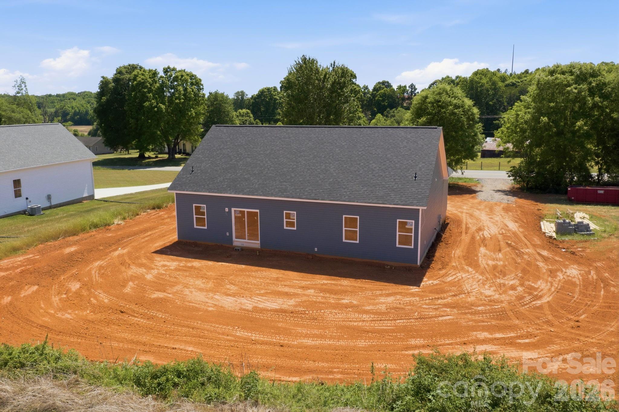 1720 Jennings Road Olin, NC 28660 - Photo 12 of 15 a view of a house with a yard