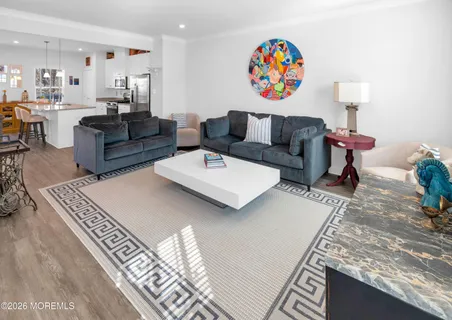 a bedroom with a bed and a table