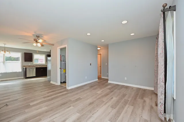 an entryway in a hall with an entryway and stairs