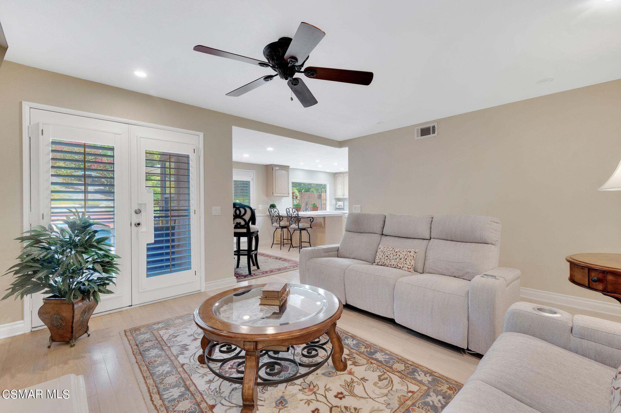 506 Innwood Road Simi Valley, CA 93065 - Photo 21 of 54 a living room with furniture and a potted plant