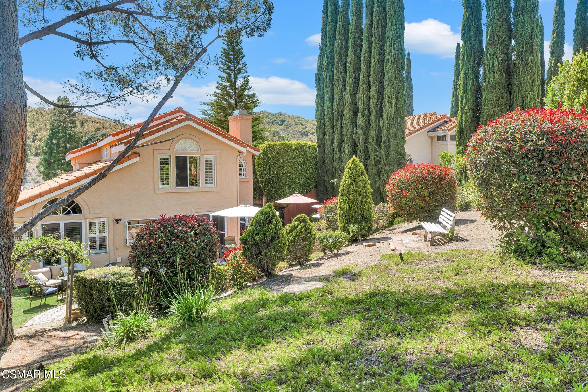 506 Innwood Road Simi Valley, CA 93065 - Photo 50 of 54 a front view of a house with garden