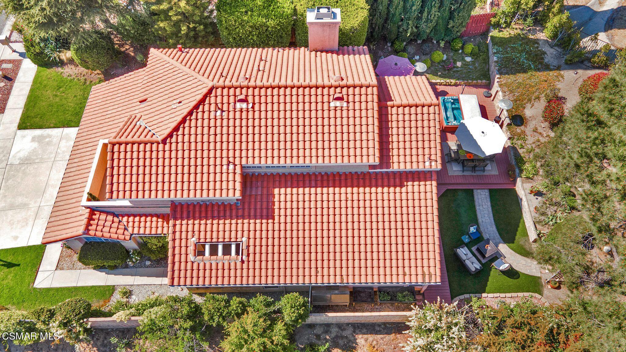 506 Innwood Road Simi Valley, CA 93065 - Photo 53 of 54 a view of a brick wall with plants and large trees