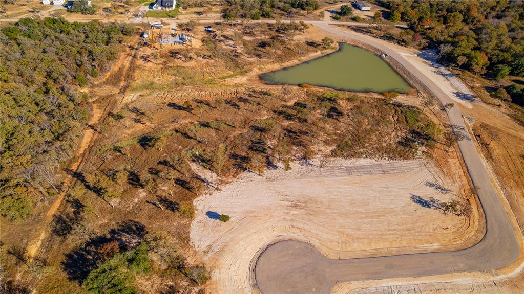 Lot 3 Suade Way Weatherford, TX 76088 - Photo 15 of 17 wooden view of water heater and covered with snow
