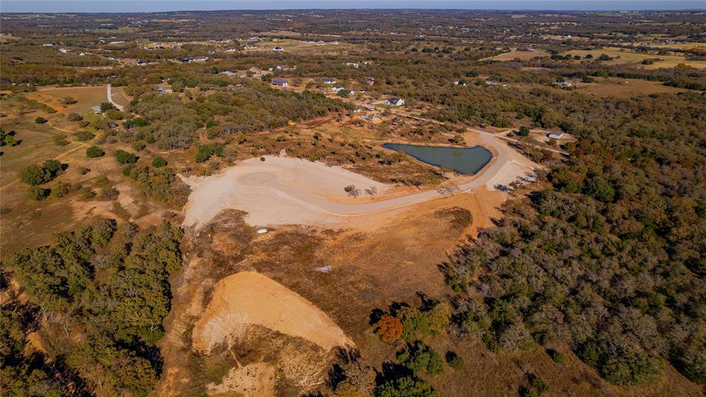Lot 3 Suade Way Weatherford, TX 76088 - Photo 4 of 17 an aerial view of residential houses with outdoor space