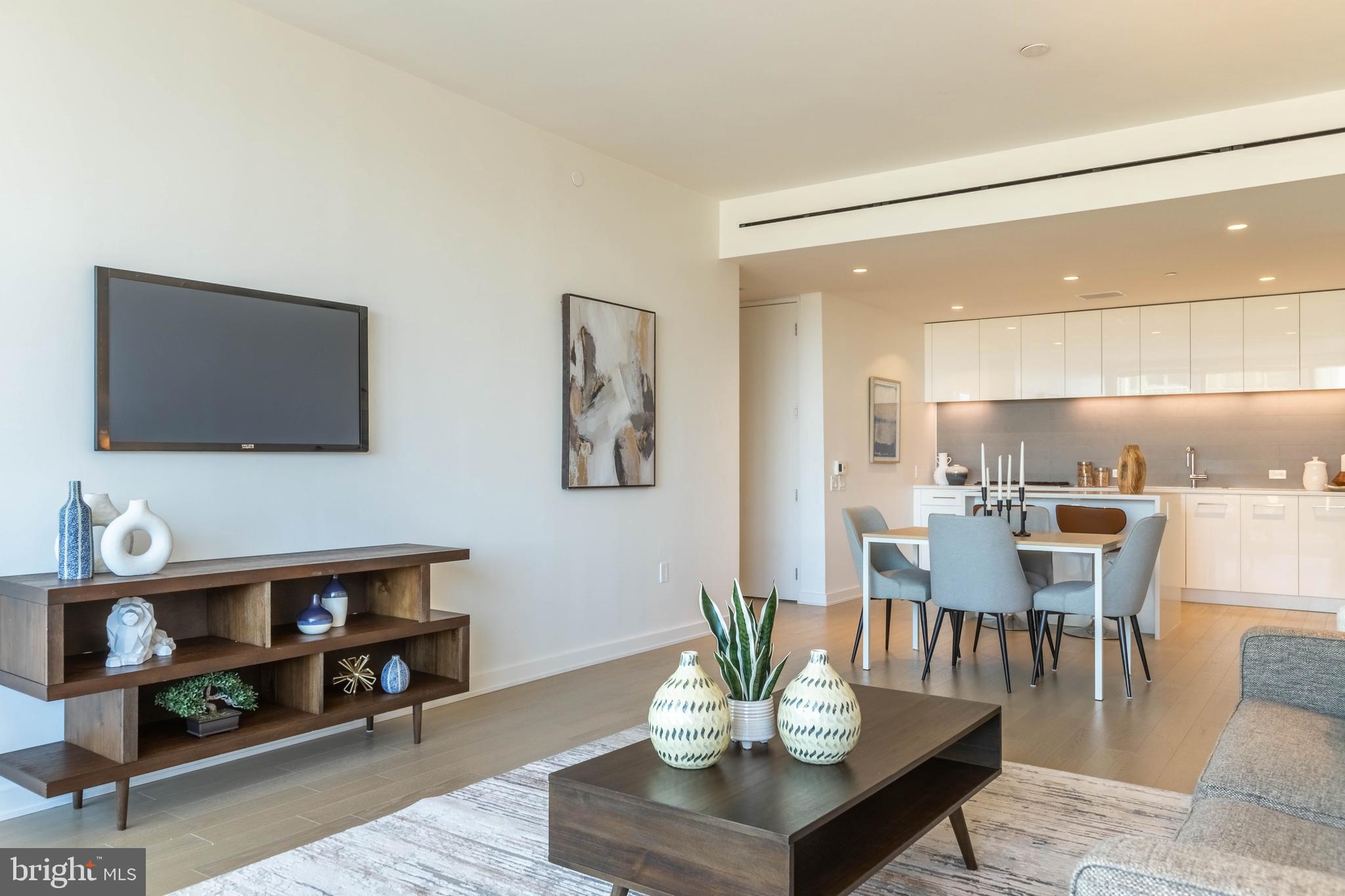 1111 24th Street Northwest, Unit 72 Washington, DC 20037 - Photo 9 of 20 Living room view into kitchen