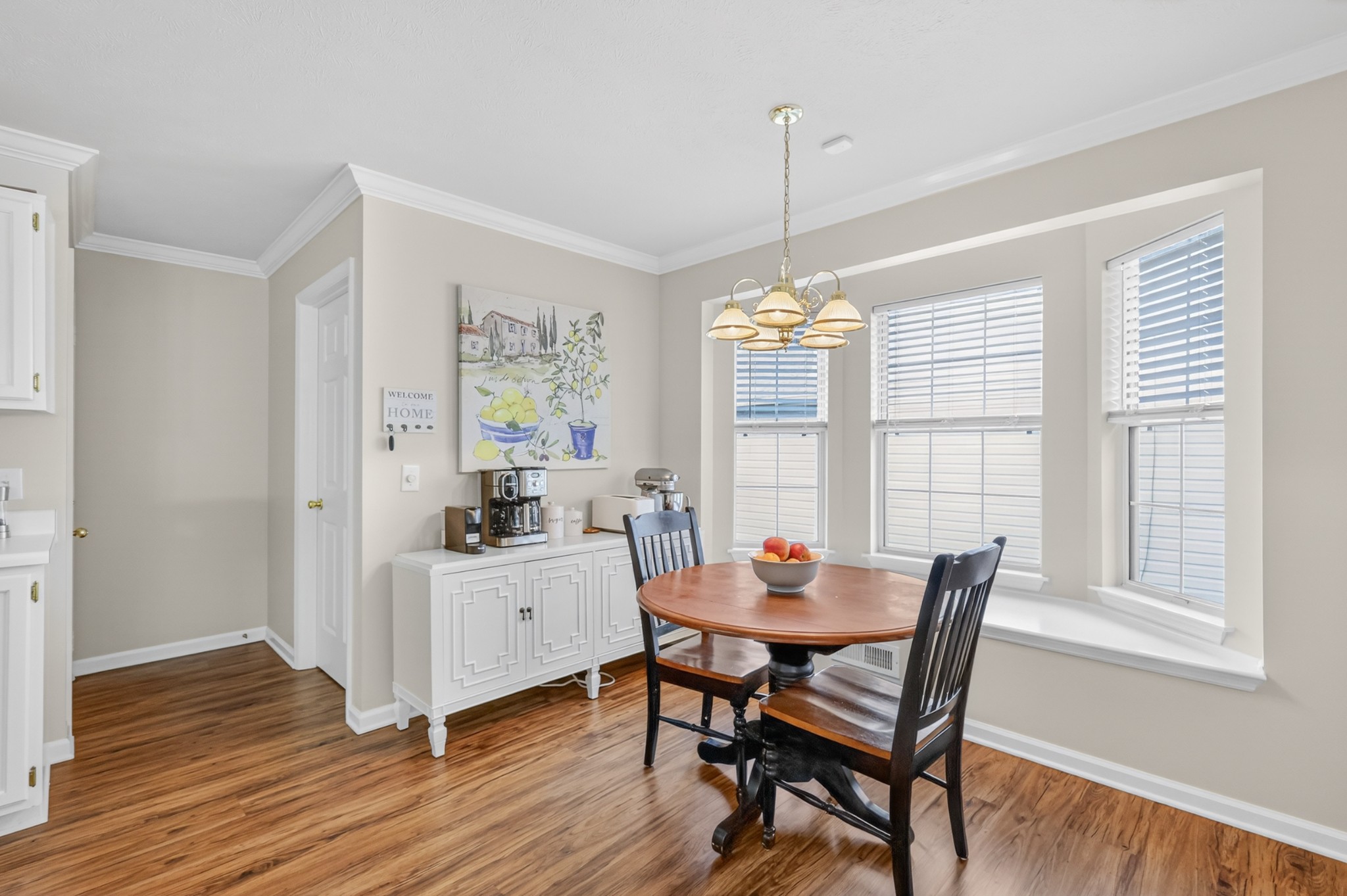 136 Holt Hills Road Nashville, TN 37211 - Photo 13 of 30 a view of a dining room with furniture windows and wooden floor