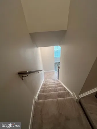 a view of balcony with wooden floor