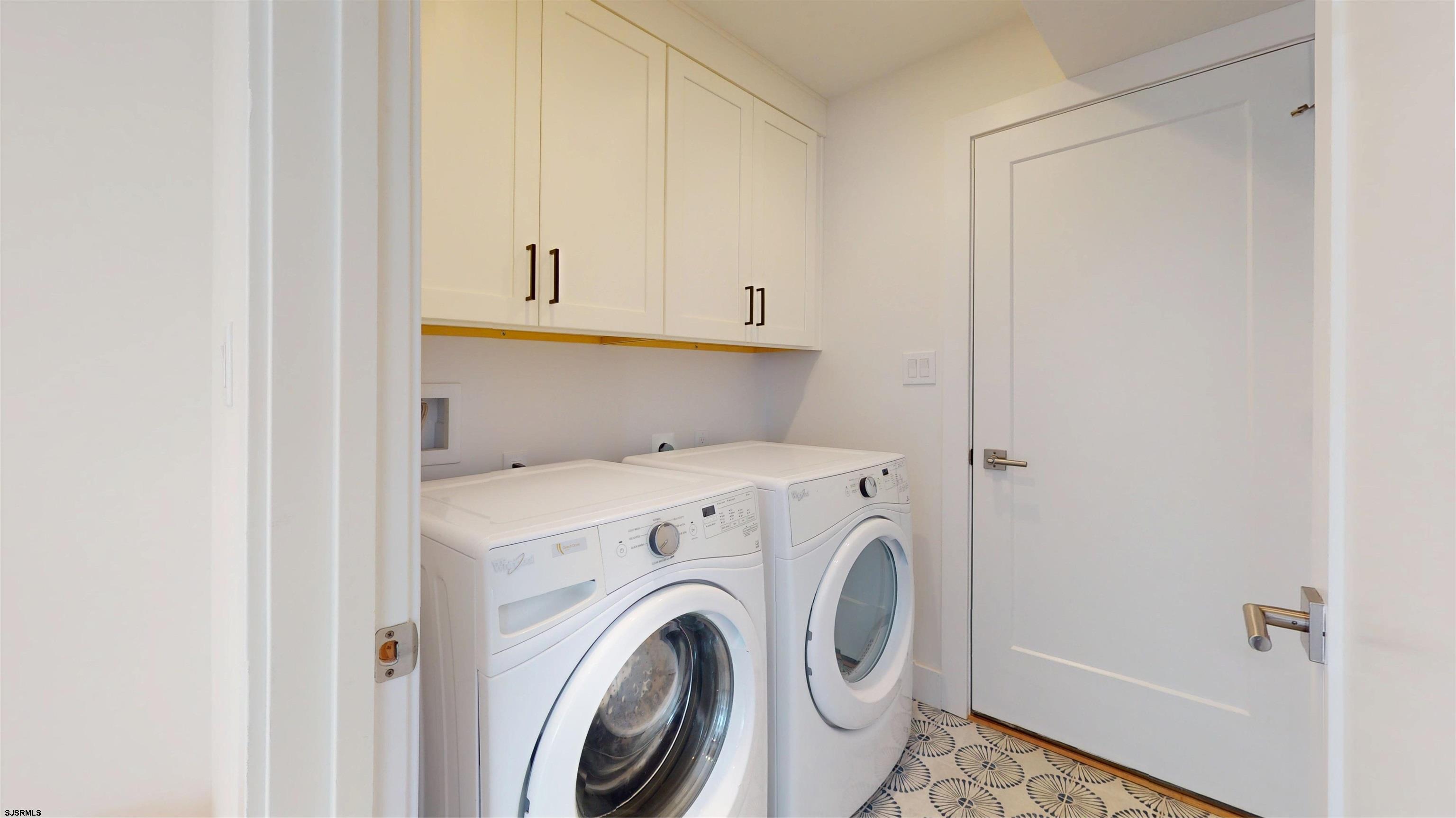 342 38th Street South Brigantine, NJ 08203 - Photo 19 of 86 a view of storage and utility room with washer and dryer