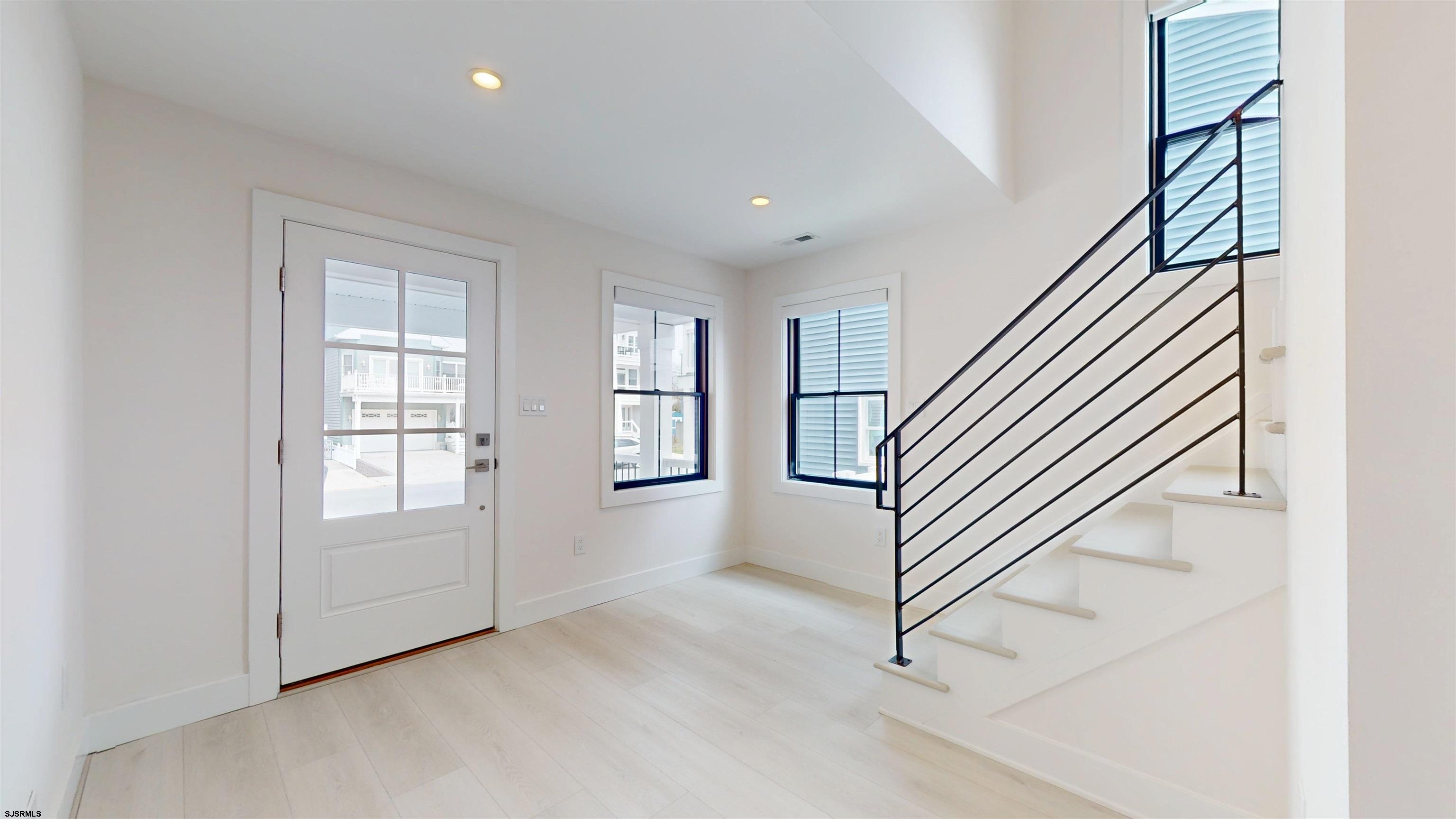 342 38th Street South Brigantine, NJ 08203 - Photo 32 of 86 an entryway in a hall with windows