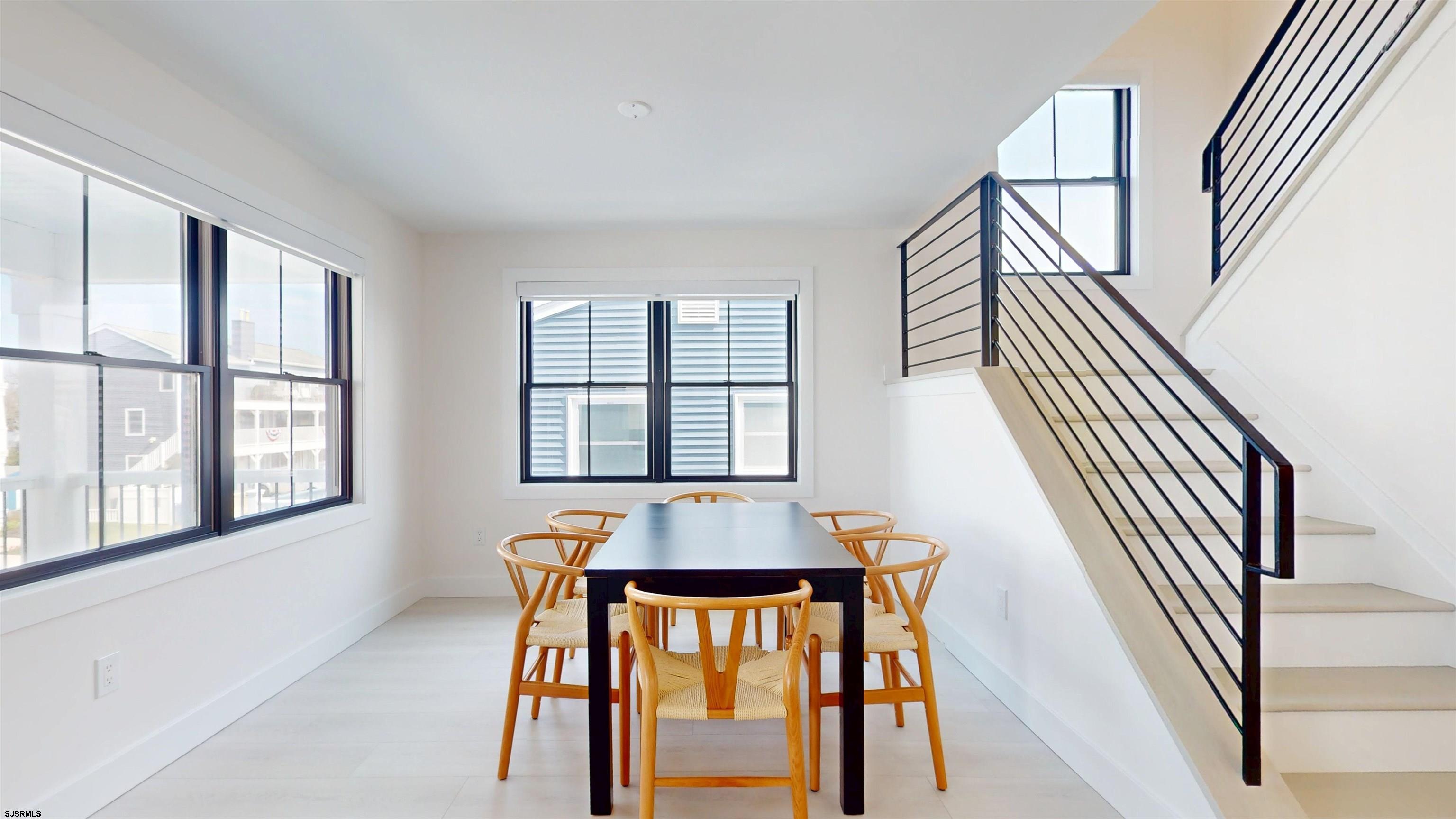 342 38th Street South Brigantine, NJ 08203 - Photo 38 of 86 a view of a dining room with furniture and a window