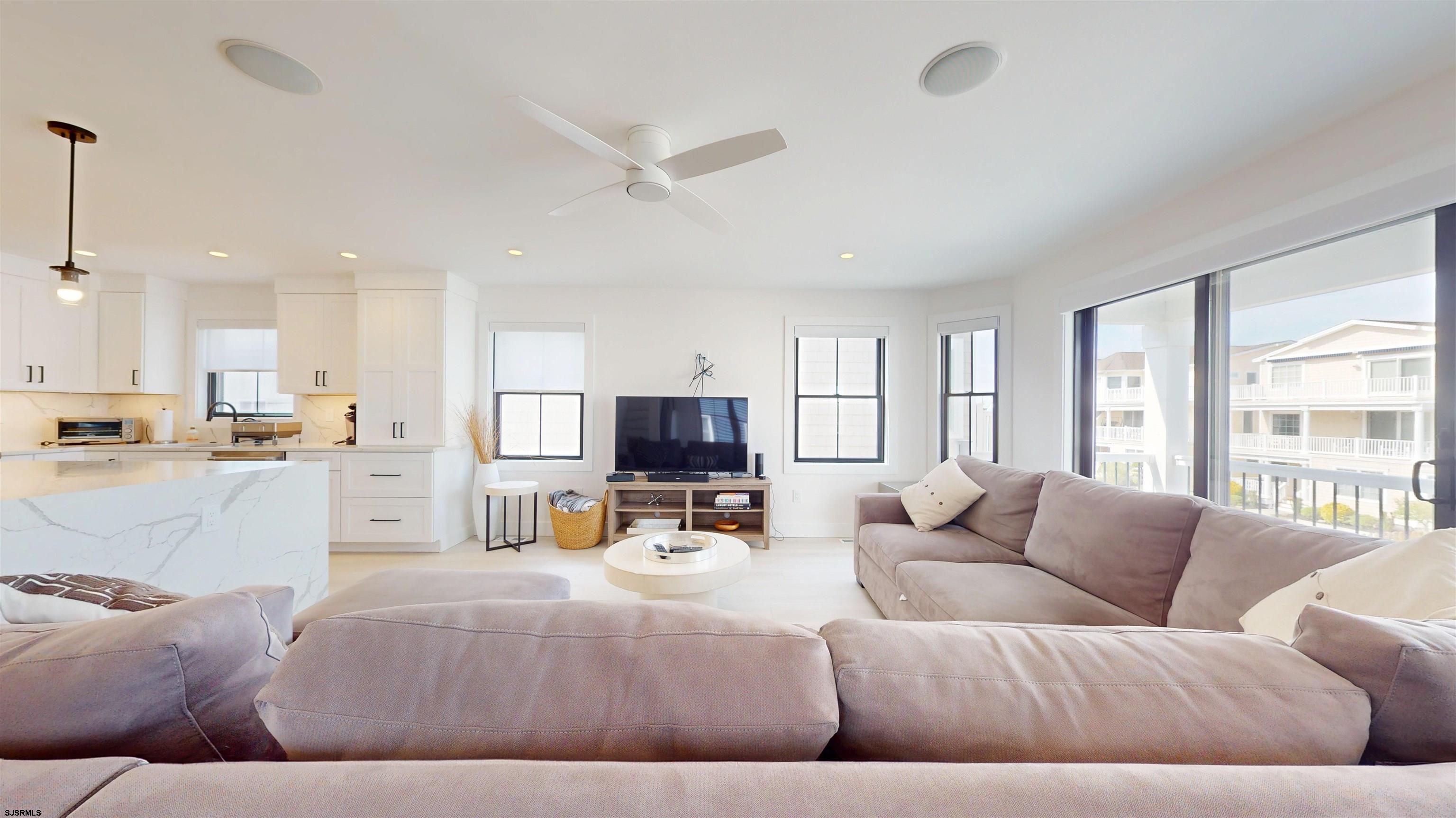 342 38th Street South Brigantine, NJ 08203 - Photo 4 of 86 a living room with furniture and a large window