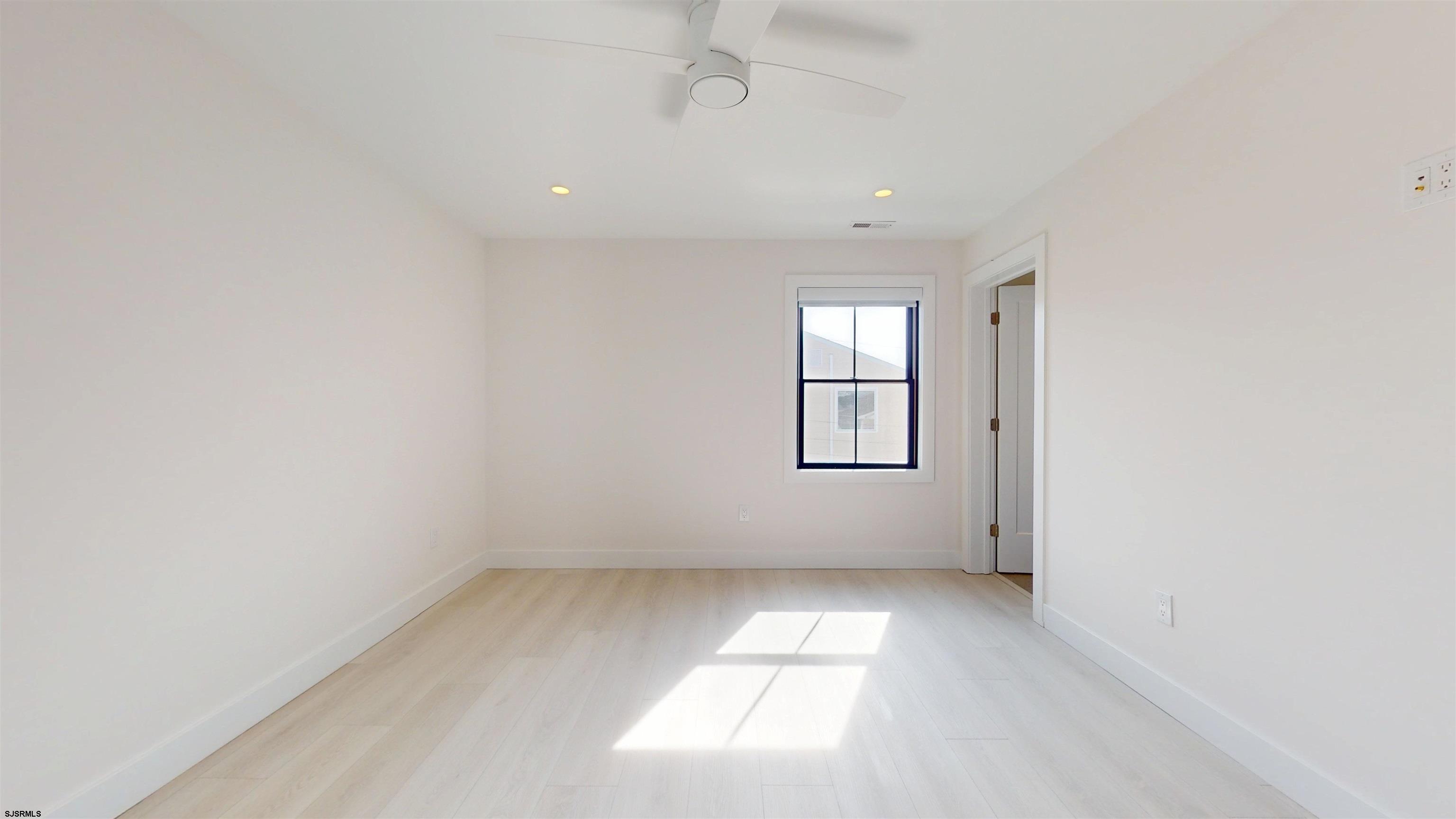 342 38th Street South Brigantine, NJ 08203 - Photo 43 of 86 an empty room with windows