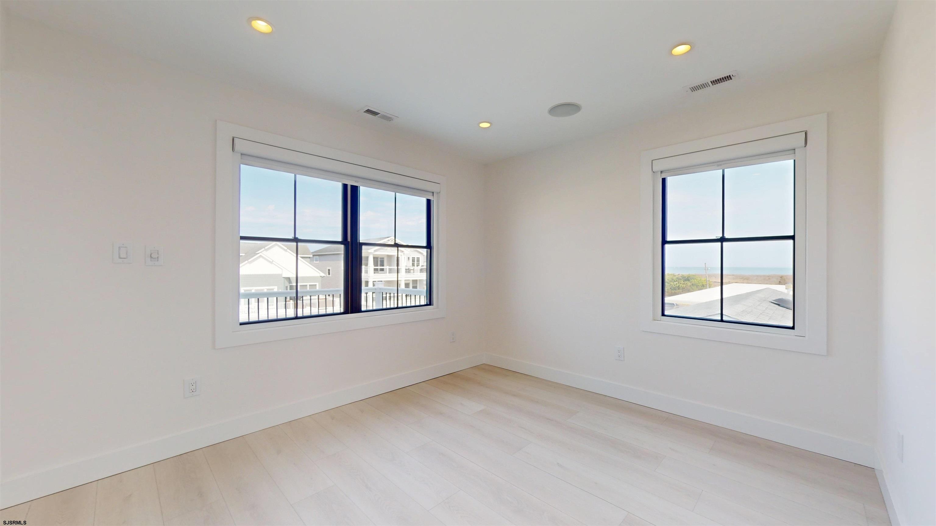342 38th Street South Brigantine, NJ 08203 - Photo 47 of 86 an empty room with a window