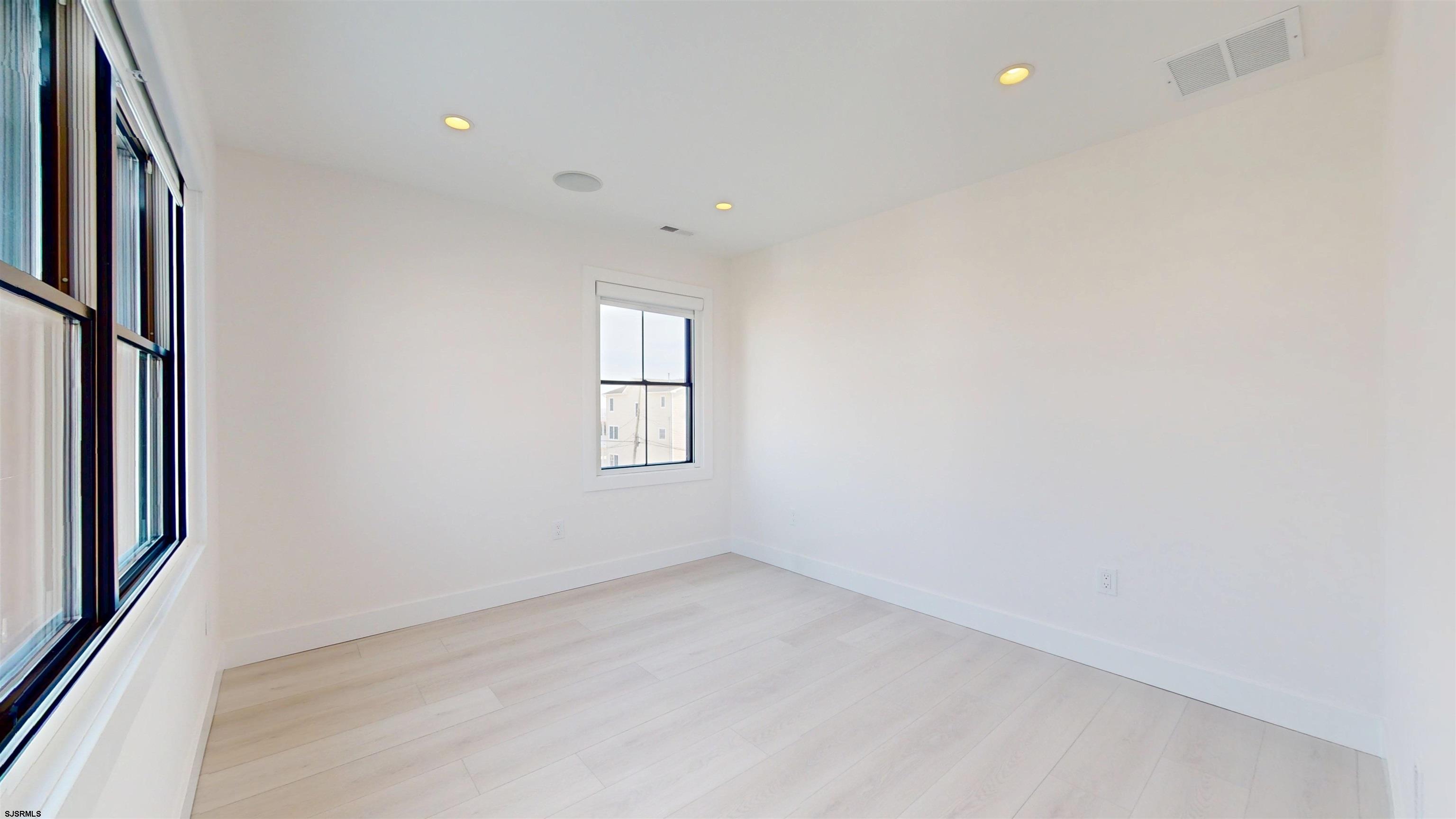 342 38th Street South Brigantine, NJ 08203 - Photo 48 of 86 an empty room with windows