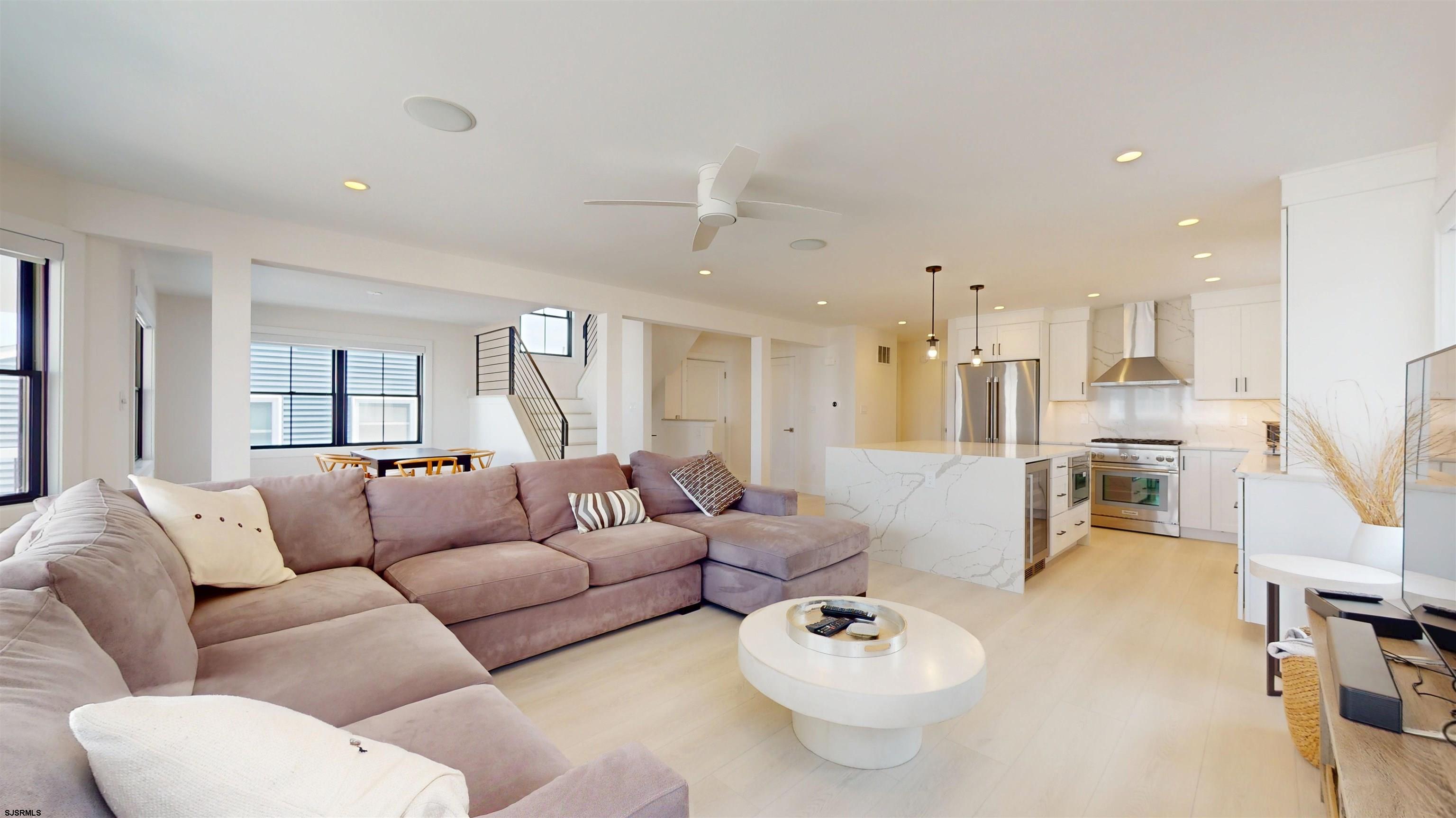 342 38th Street South Brigantine, NJ 08203 - Photo 8 of 86 a living room with furniture and a large window