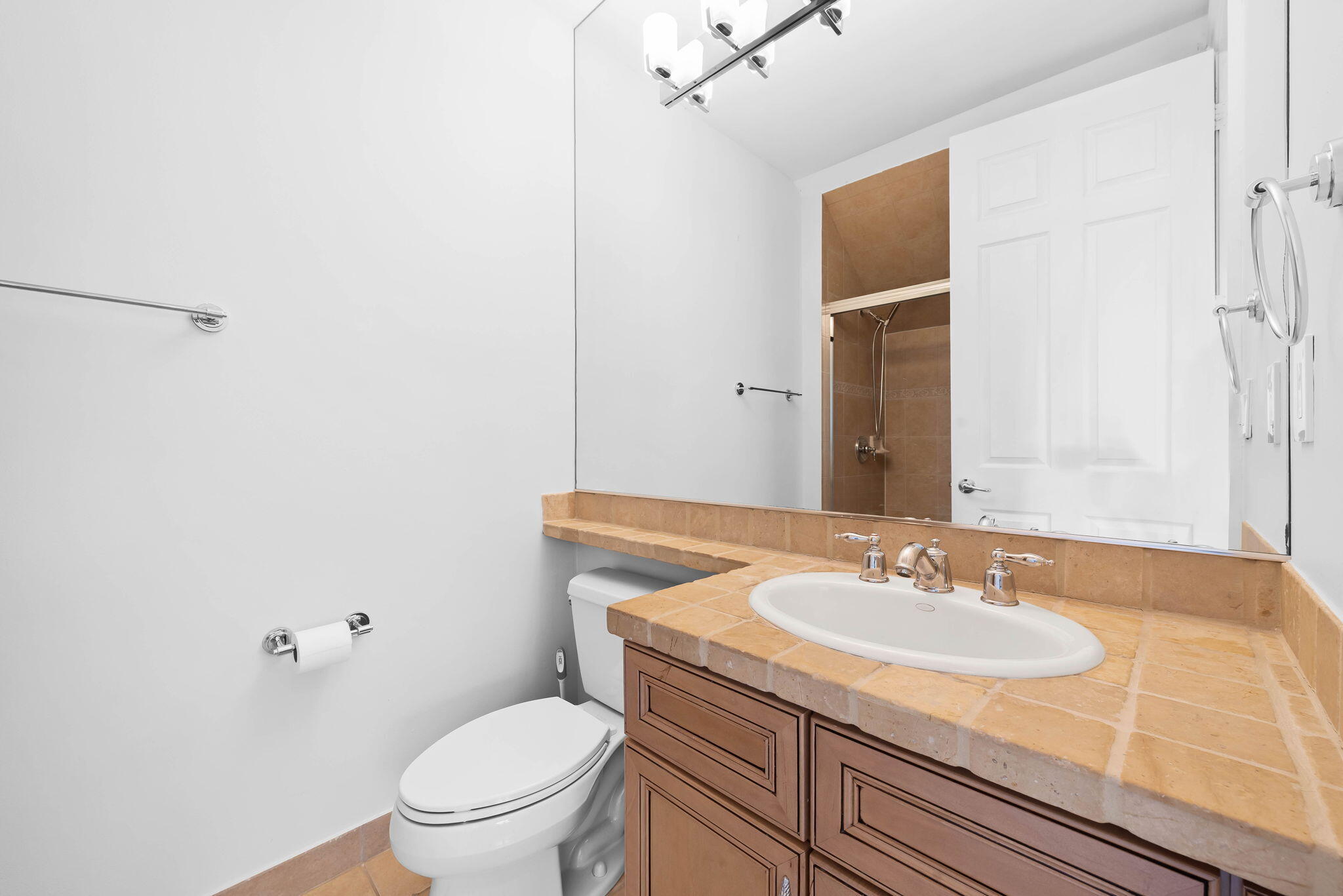 10774 Sunset Ridge Circle Boynton Beach, FL 33473 - Photo 13 of 39 a bathroom with a sink and a toilet