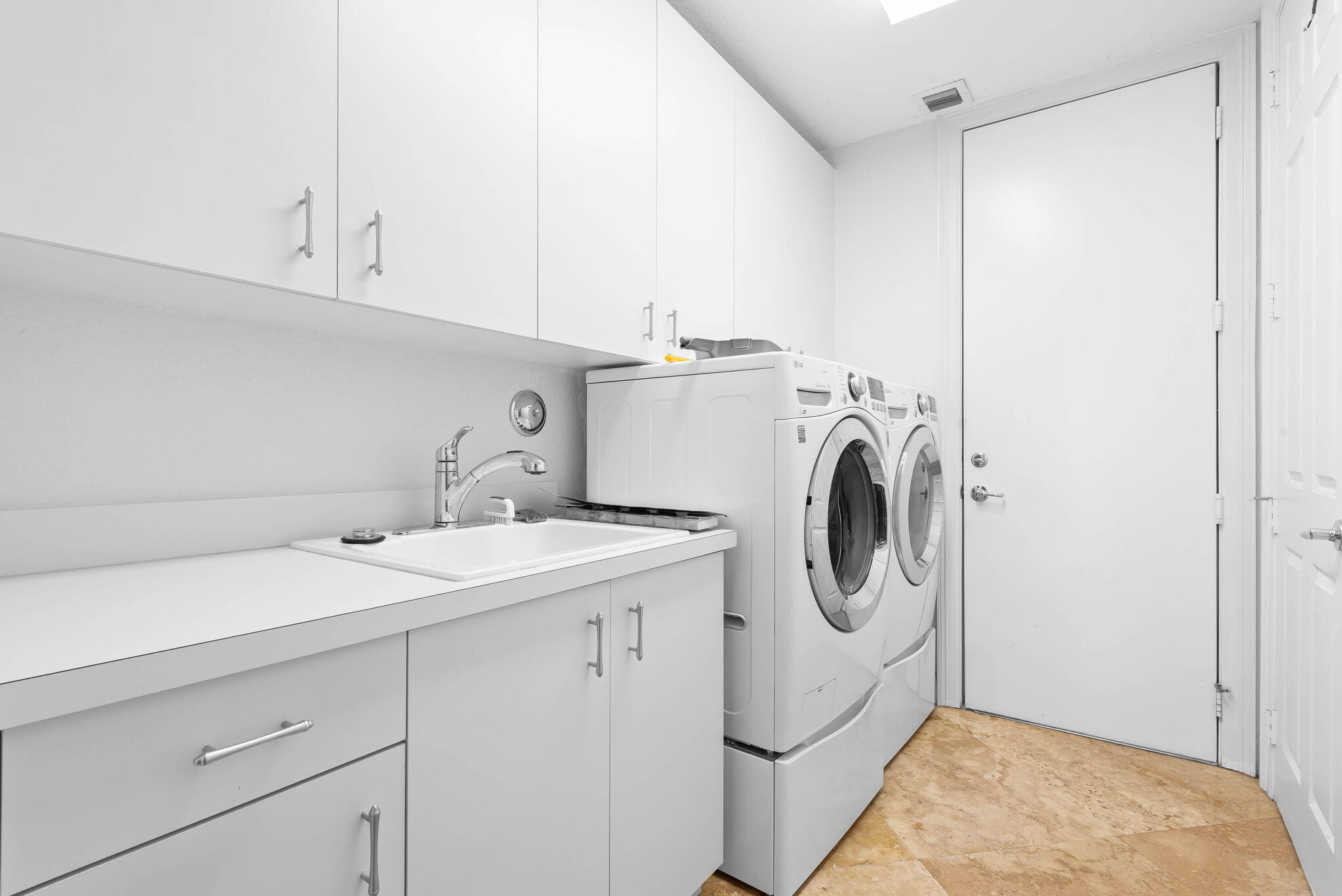 10774 Sunset Ridge Circle Boynton Beach, FL 33473 - Photo 14 of 39 a utility room with sink dryer and washer